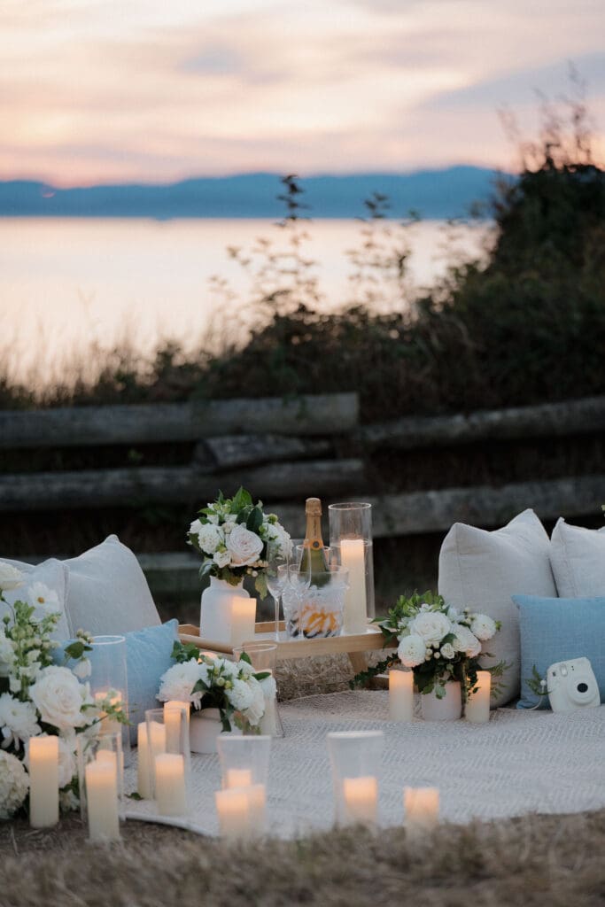 Candles and florals arranged for a private evening proposal in Victoria BC