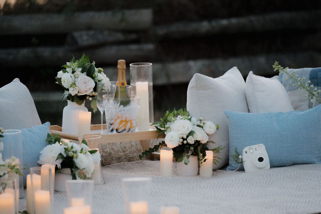 Candles and florals arranged for a private evening proposal in Victoria BC