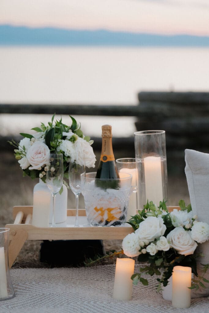 Candles and florals arranged for a private evening proposal in Victoria BC