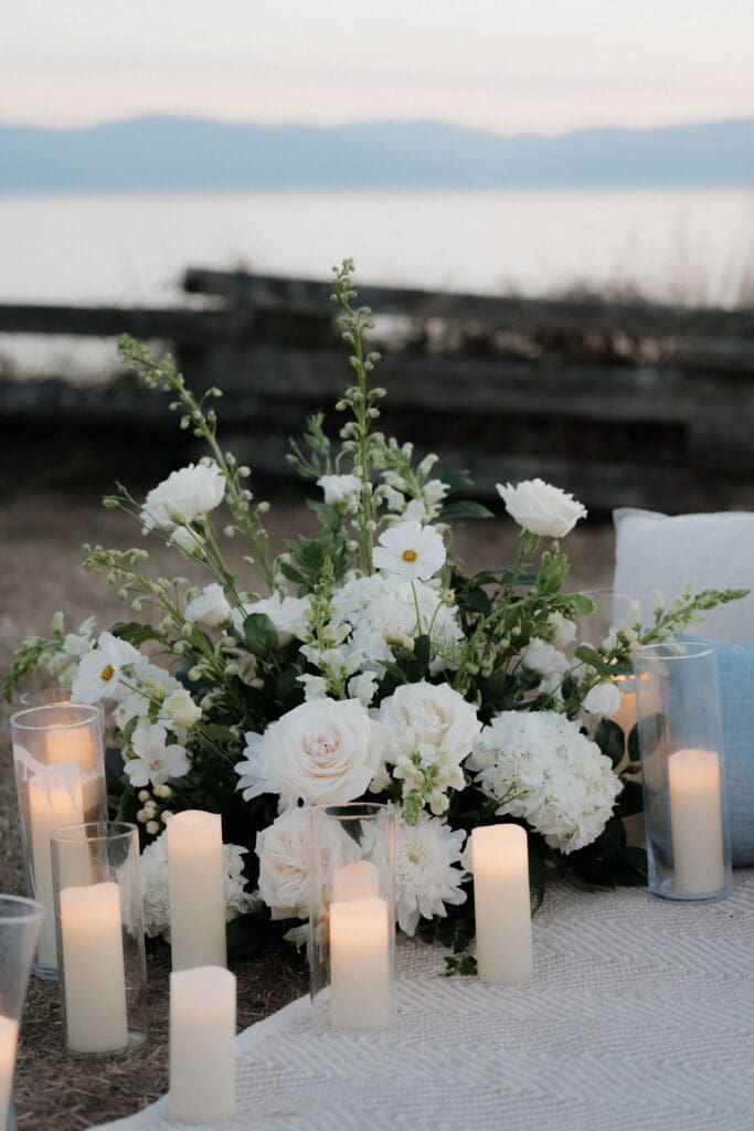 Candles and florals arranged for a private evening proposal in Victoria BC