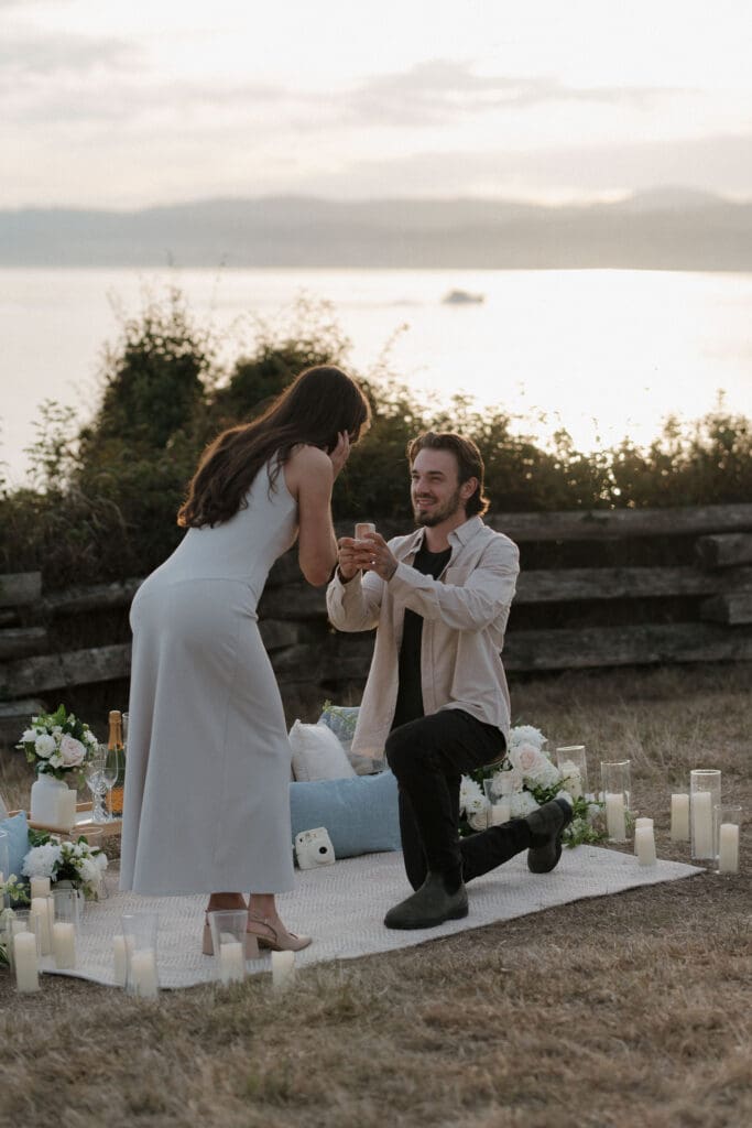 Candles and florals arranged for a private evening proposal in Victoria BC