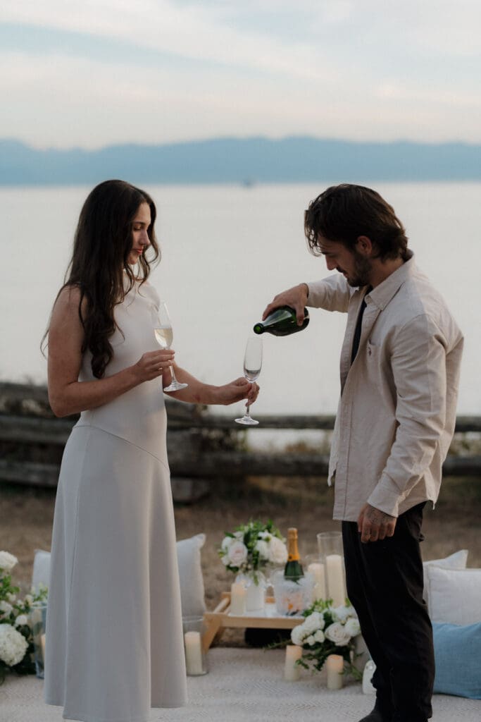 Surprise Proposal Planner Hayley Zumkeller sets up luxury picnic proposal along Dallas Road Oceanfront in Victoria BC for couple