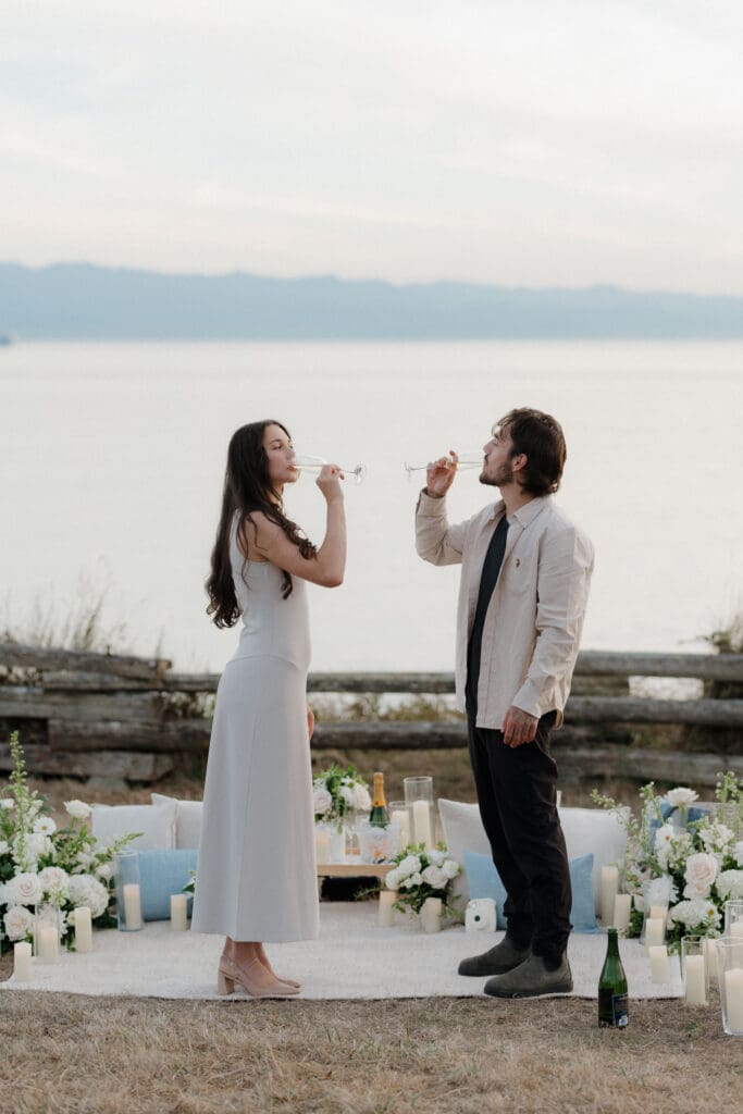 Surprise Proposal Planner Hayley Zumkeller sets up luxury picnic proposal along Dallas Road Oceanfront in Victoria BC for couple