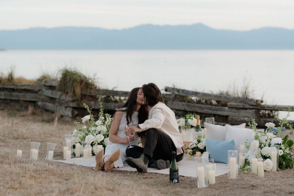 Surprise Proposal Planner Hayley Zumkeller sets up luxury picnic proposal along Dallas Road Oceanfront in Victoria BC for couple